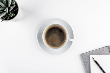 coffe cup plant notepad penicil Top view with copy space for your text . Flat lay.
