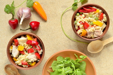 Rice with chicken and vegetables, top view, copy space