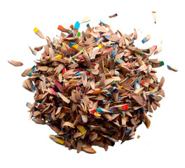 Colored pencils, shavings on a white background, isolated