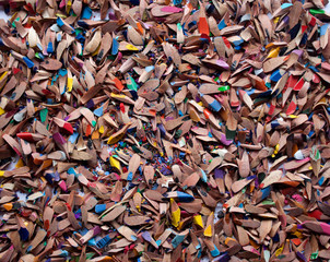 Colored pencils, shavings, background.