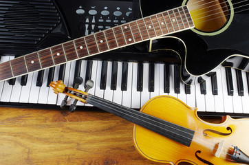 Fototapeta premium Acoustic guitar and keyboard synthesizer