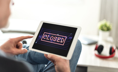 Closed stock market concept on a tablet
