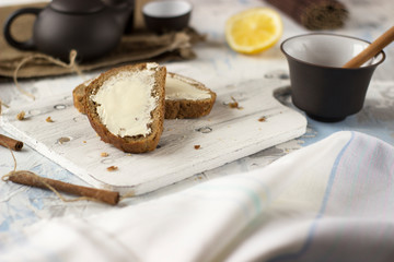 Pieces of bread with butter and honey