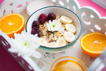 Delicious and healthy breakfast on a white tray. Space for a text. Top view.