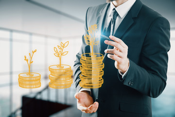 Double exposure with growth coins columns and man hand. Concept of success savings and capital.