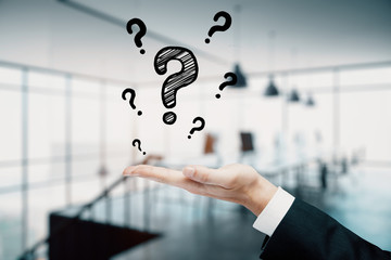 Double exposure of man hands with question marks. Consept of asking and searching information.