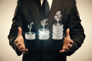 Double exposure with growth coins columns and man hand. Concept of success savings and capital.