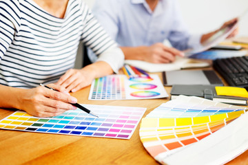 designer graphic creative creativity working together coloring using graphics tablet and a stylus...