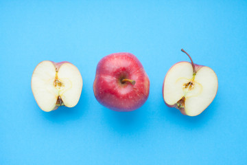 Healthy food concept. Fruits and curd on the blue background. Top view. Space for a text.