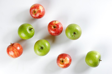 red green apple on white background