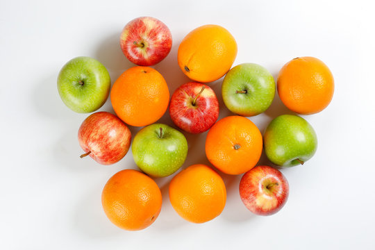 red green apple orange fruit on white background © oqba