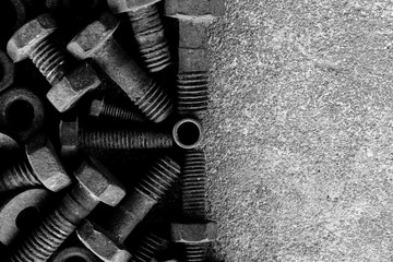 many rust steel on cement ground in black and white photography