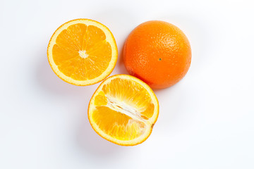 Orange Fruit half cut slices top view white background