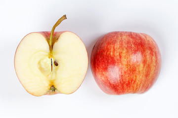 red apple whole half cut slice top view on white background