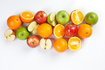 mix green red apple orange whole fruit cut slice half on white background