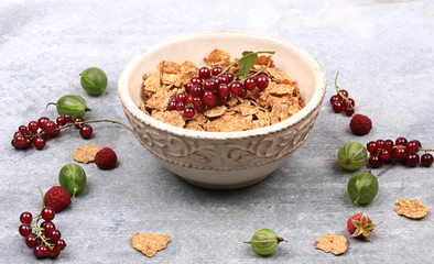 flakes with berries for a healthy breakfast. fresh granola muesli
