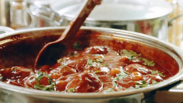 Cooking meatballs in tomato sauce