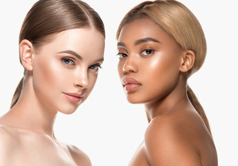 Two wemen with dark and light skin tone caucasian and african american models with different skintones lines beauty healthy concept - obrazy, fototapety, plakaty