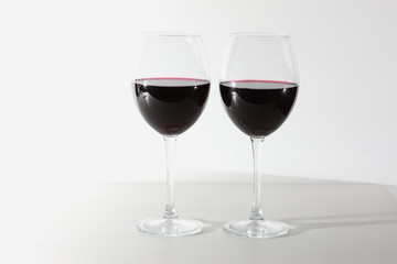 Glass of red wine isolated on white background. A glass of red wine. Copy space. Concept restaurant, alcohol, party.