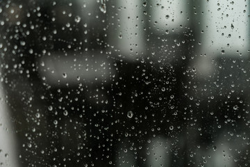 raindrops on window glass - 251778724