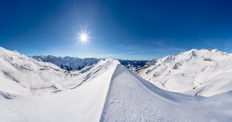 Alpine winter landscape of the Nebelhorn mountain near Oberstdorf, Germany, on a sunny day.