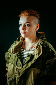 Portret Of Young Woman With Red Hair In Military Uniform. Vertical Photo