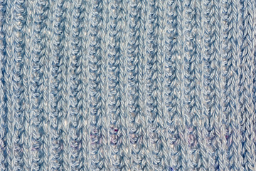 Texture, gray knitted jersey close up. Blank wool background.
