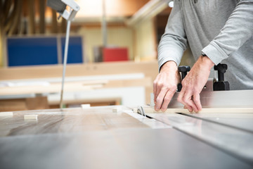 Carpenter work on wood plank
