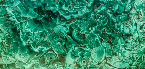 Malachite green mineral gemstone texture,malachite background, green background. Amazing polished natural slab of green malachite mineral gemstone specimen gemstone macro as a background - obrazy, fototapety, plakaty
