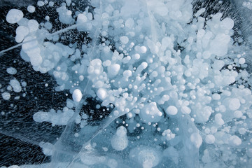 Bubbles of methane on the black ice of Lake Baikal