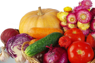 Pumpkin and other vegetables on white