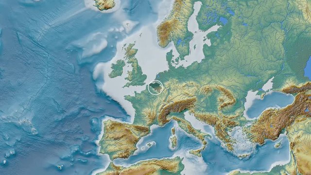Belgium area presented against the global relief map in the Patterson Cylindrical projection with animated oblique transformation