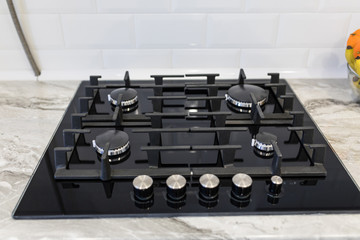Modern stylish kitchen gas stove. Kitchen accesories