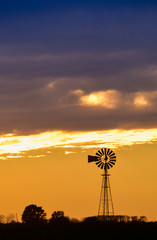 Landscape with windmill at sunset, Pampas, Patagonia,Argentina