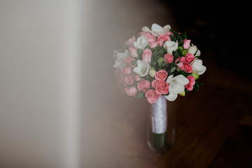 Bouquet of flowers live on a green background.
