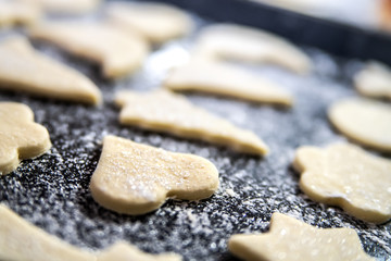 Fototapeta na wymiar Heart shaped cookies ready to be baked.