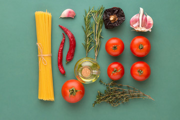 Creative food poster with flat lay knolling of Italian arrabiata pasta ingredients. Spaghetti...