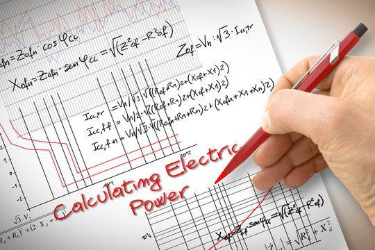 Engineer writing formulas and graph about electric power in buildings - concept image