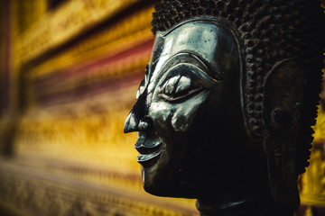 The Buddha face used as an amulet of Buddhism in Asia.