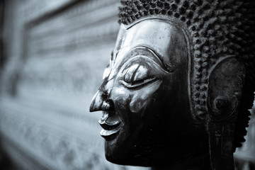 The Buddha face used as an amulet of Buddhism in Asia.