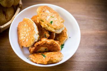 fried chicken cutlets in a white bowl