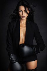 beautiful lady in boxer gloves posing in lingerie