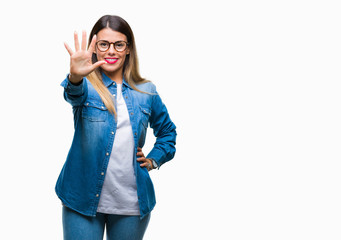 Young beautiful woman over wearing glasses over isolated background showing and pointing up with fingers number five while smiling confident and happy.