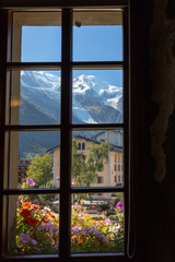 Mount Mont Blanc summit view throgh window.