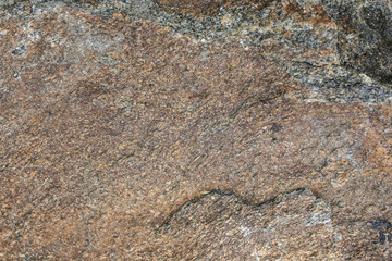 Old natural grey stone texture background. Vertical photo.