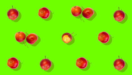 Creative idea for background. apples pattern on green background
