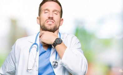 Handsome doctor man wearing medical uniform over isolated background Touching painful neck, sore throat for flu, clod and infection
