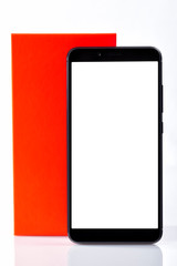 Fototapeta na wymiar A modern black smartphone with blank screen in front of its box isolated on white