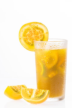 Traditional Colombian beverage made of juice and pieces of lulo (Solanum quitoense) called lulada
