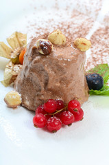 Ice-cream with chocolate and wood nuts